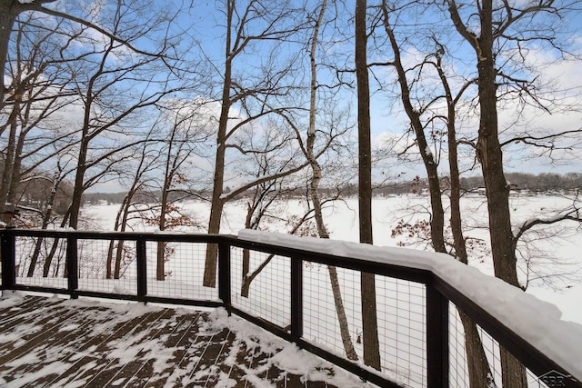 view of snow covered deck