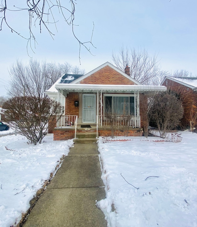 bungalow-style home featuring covered porch