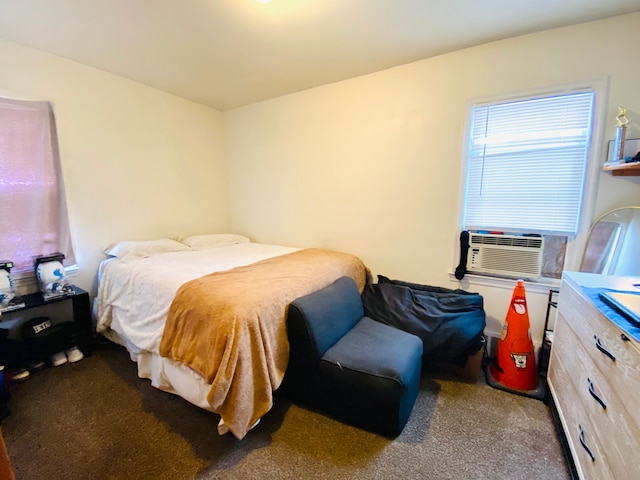 bedroom featuring cooling unit and carpet