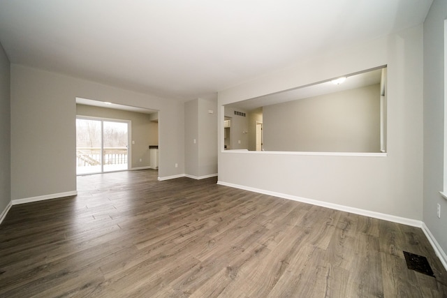 empty room featuring hardwood / wood-style flooring