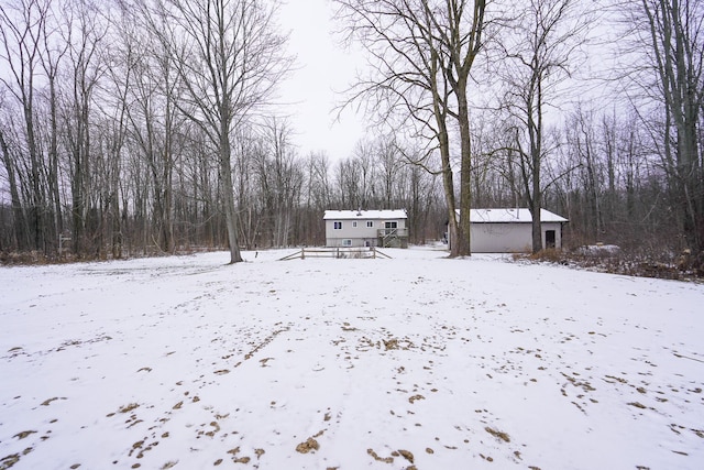 view of yard covered in snow