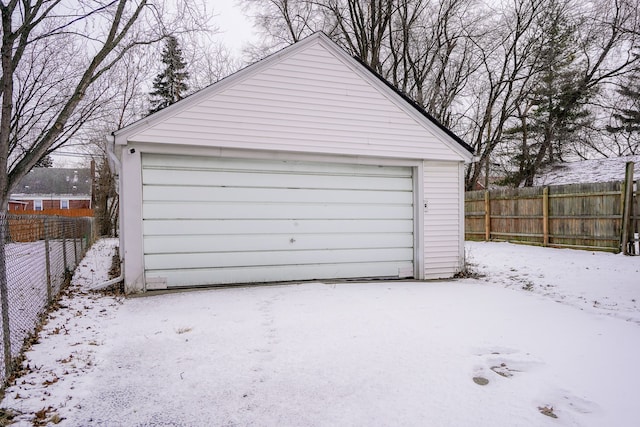 view of snow covered garage