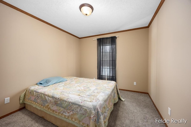 carpeted bedroom with crown molding and a textured ceiling