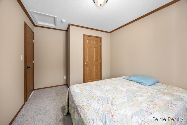 carpeted bedroom featuring crown molding and a textured ceiling