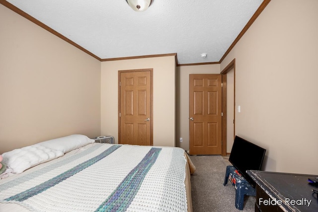 carpeted bedroom featuring crown molding and a textured ceiling