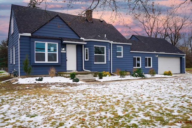 view of front of home with a garage