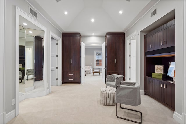 living area featuring high vaulted ceiling, recessed lighting, visible vents, and light colored carpet