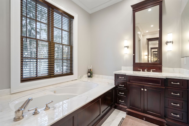 bathroom with a whirlpool tub, tile patterned flooring, ornamental molding, and vanity