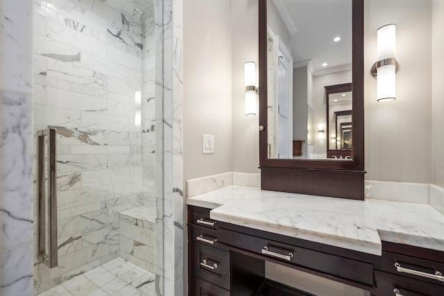 bathroom with a marble finish shower, ornamental molding, marble finish floor, vanity, and recessed lighting