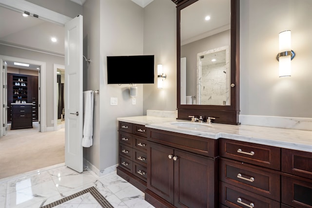 full bathroom with baseboards, ornamental molding, marble finish floor, vanity, and recessed lighting