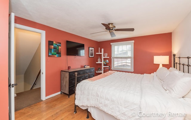 bedroom featuring ceiling fan and light wood-type flooring