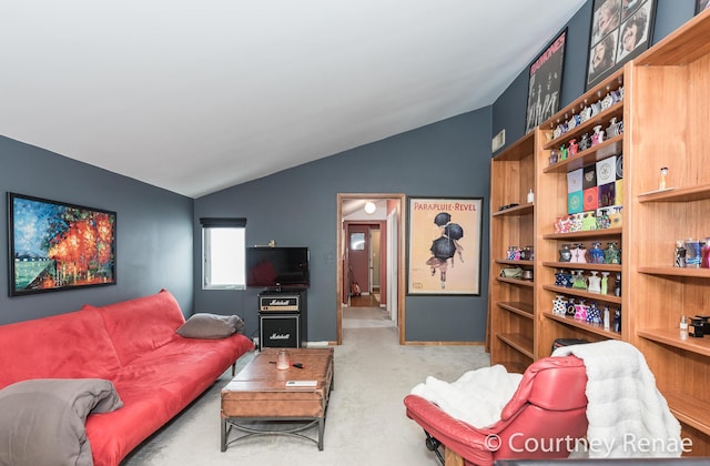 carpeted living room featuring lofted ceiling