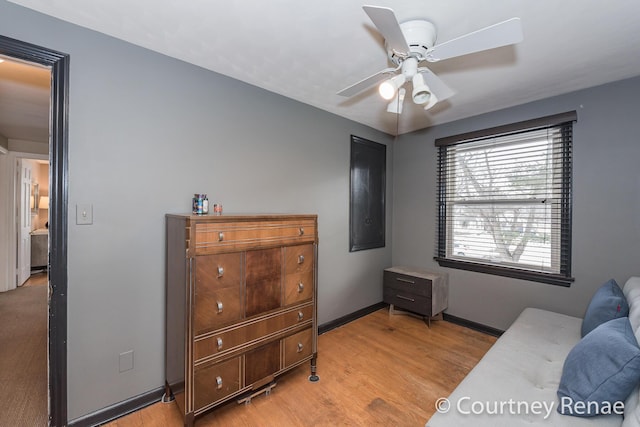 bedroom featuring ceiling fan and light hardwood / wood-style floors