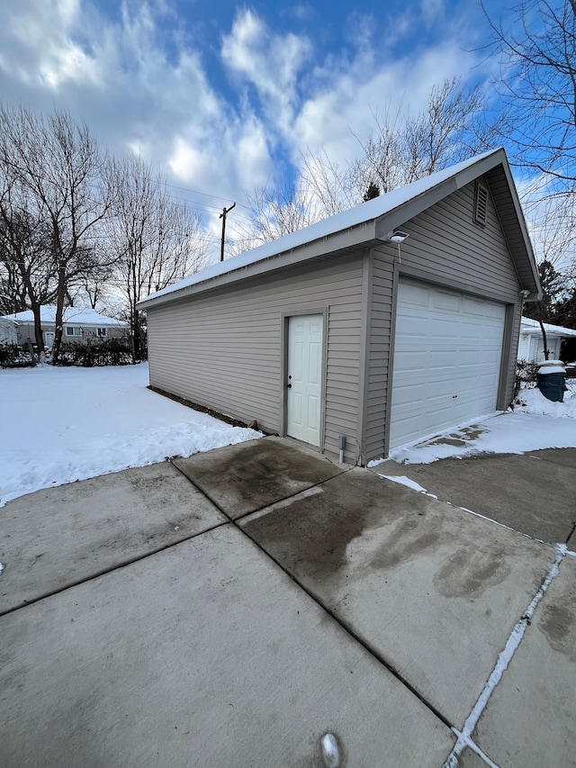 view of snow covered garage