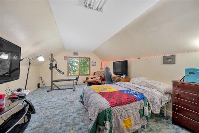 bedroom featuring lofted ceiling and carpet