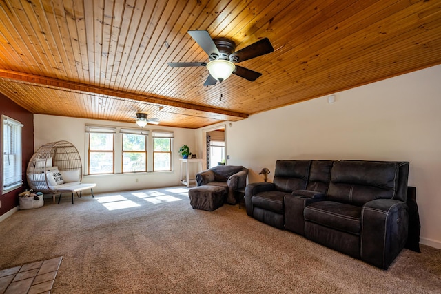 living room featuring carpet, a wealth of natural light, and wooden ceiling