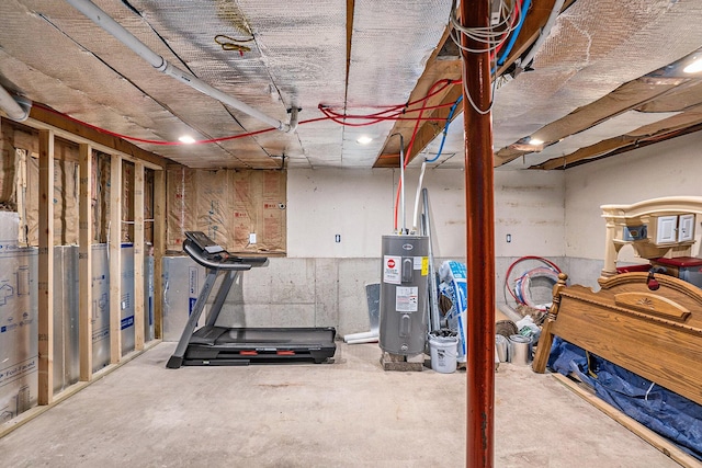 basement featuring electric water heater
