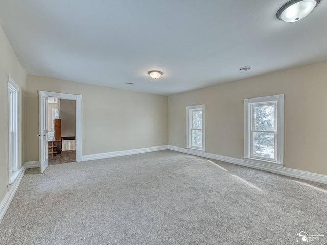 view of carpeted spare room