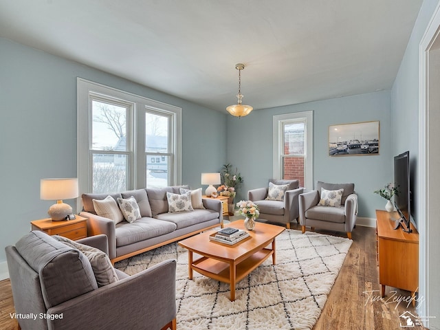 living room with light hardwood / wood-style floors