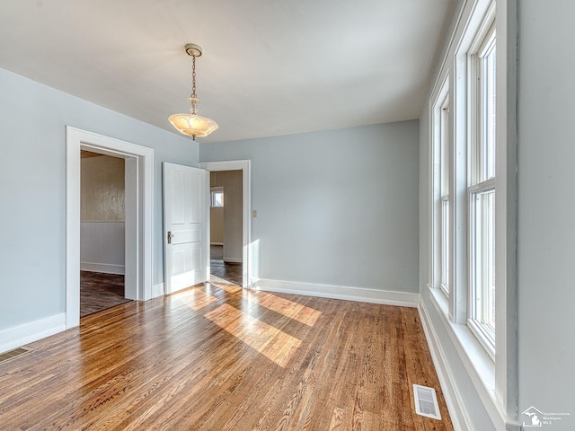 empty room featuring hardwood / wood-style floors