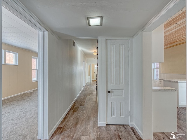 hallway with light wood-type flooring