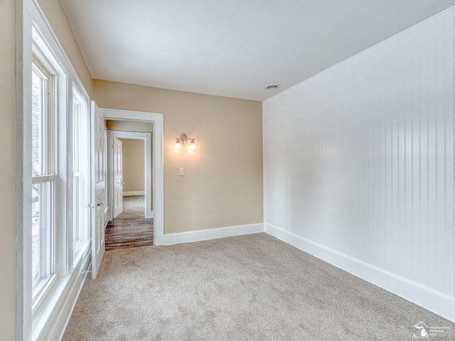 empty room featuring carpet flooring