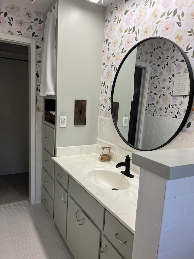 bathroom with vanity and tile patterned flooring