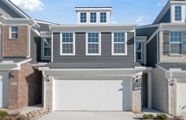 view of front of home featuring a garage