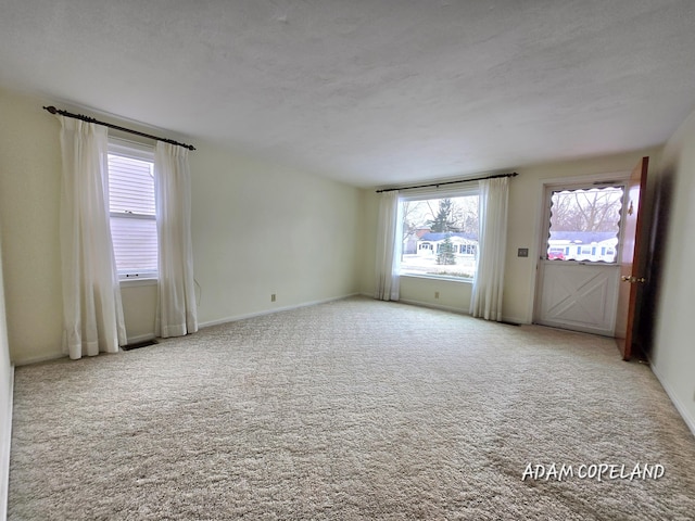 view of carpeted spare room