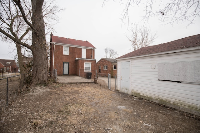 rear view of house featuring a patio and central air condition unit