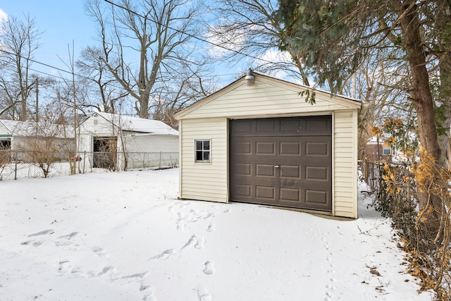 view of snow covered garage