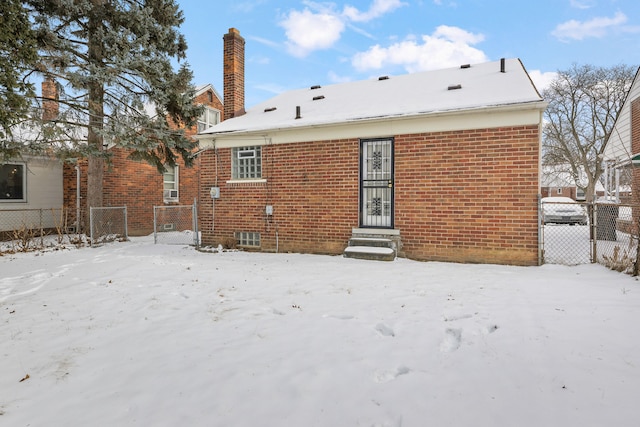 view of snow covered house