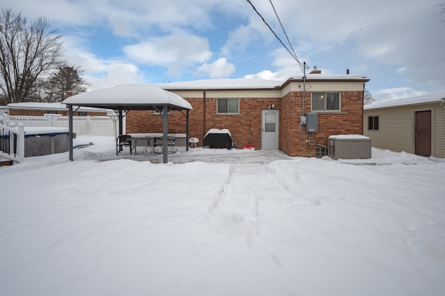 view of snow covered house