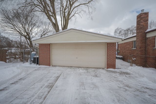 view of snow covered garage