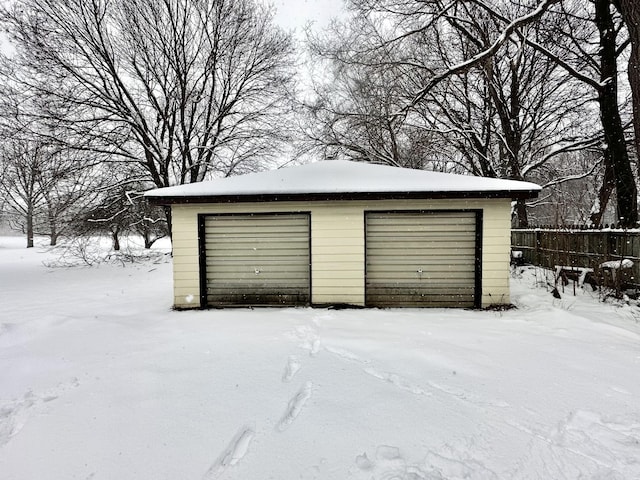 view of snow covered garage