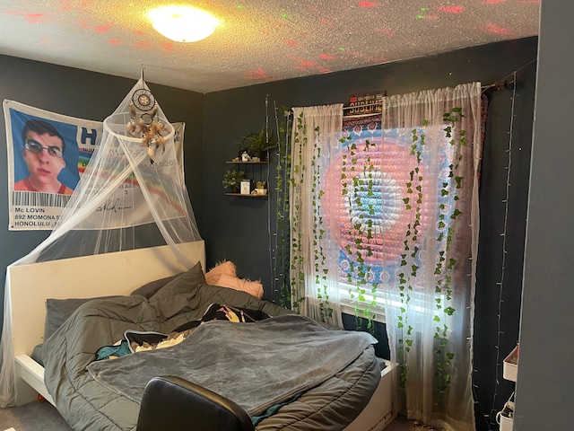 bedroom featuring a textured ceiling