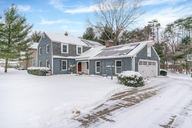 front of property featuring a garage