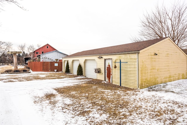 view of snow covered garage