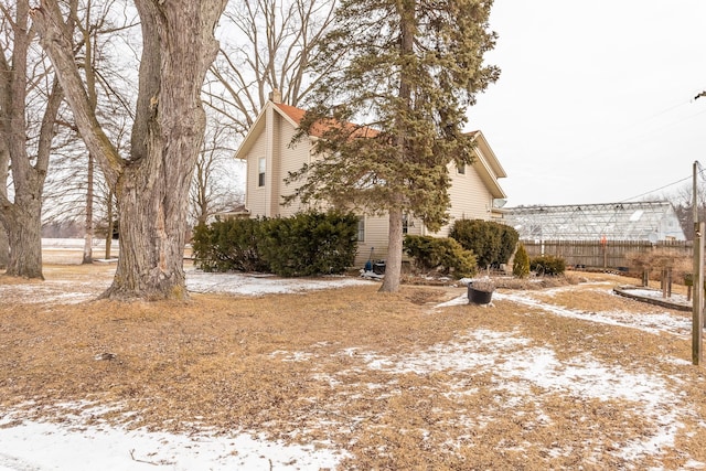 view of yard covered in snow