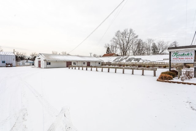 view of yard layered in snow