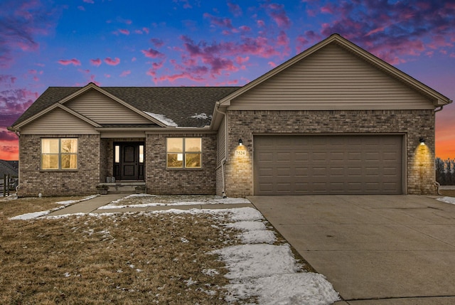 view of front of home with a garage