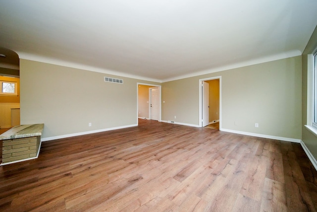 spare room with light hardwood / wood-style floors