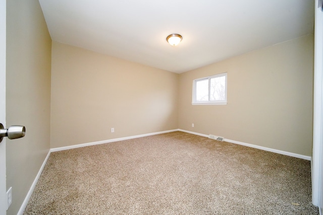 view of carpeted spare room