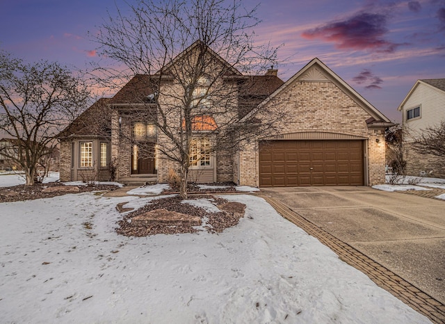 view of front of property featuring a garage