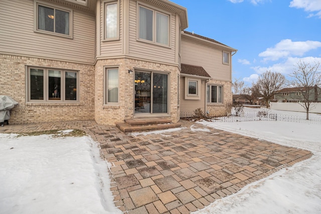 view of snow covered property