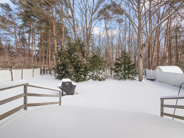 view of yard covered in snow