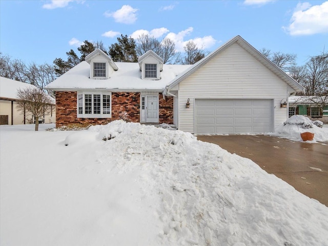 cape cod home with a garage