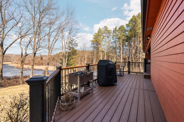 deck featuring a grill