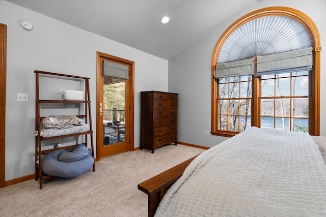 bedroom with baseboards, multiple windows, carpet, and vaulted ceiling