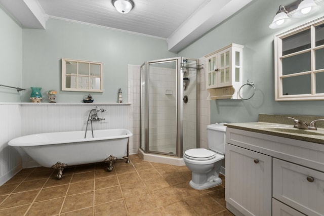 full bathroom featuring vanity, a wainscoted wall, a shower stall, crown molding, and toilet